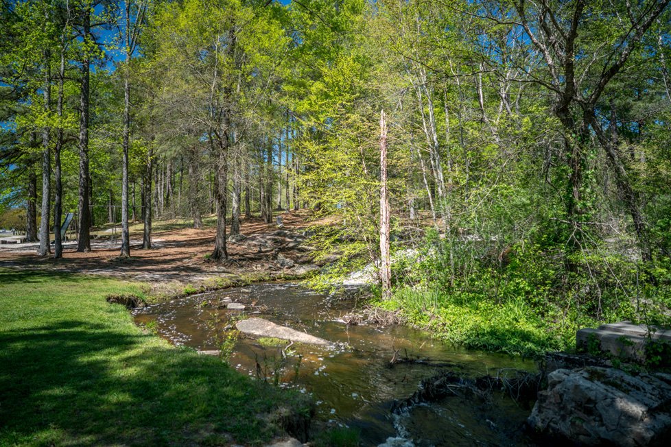 park with stream in zebulon nc