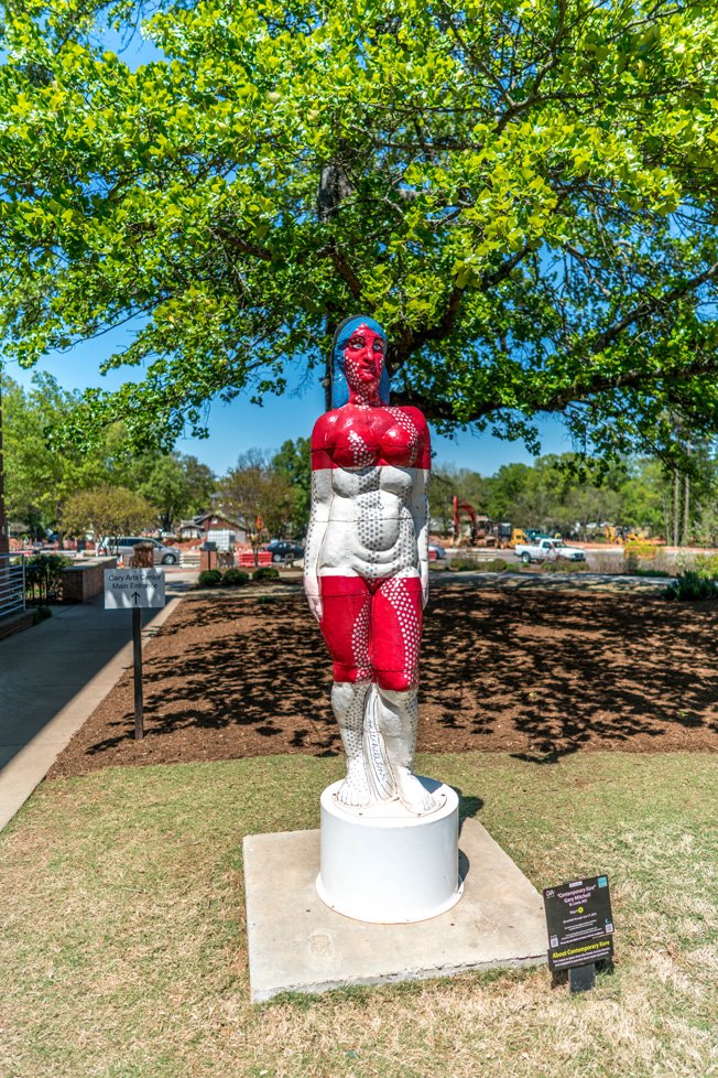 red and white statue cary nc
