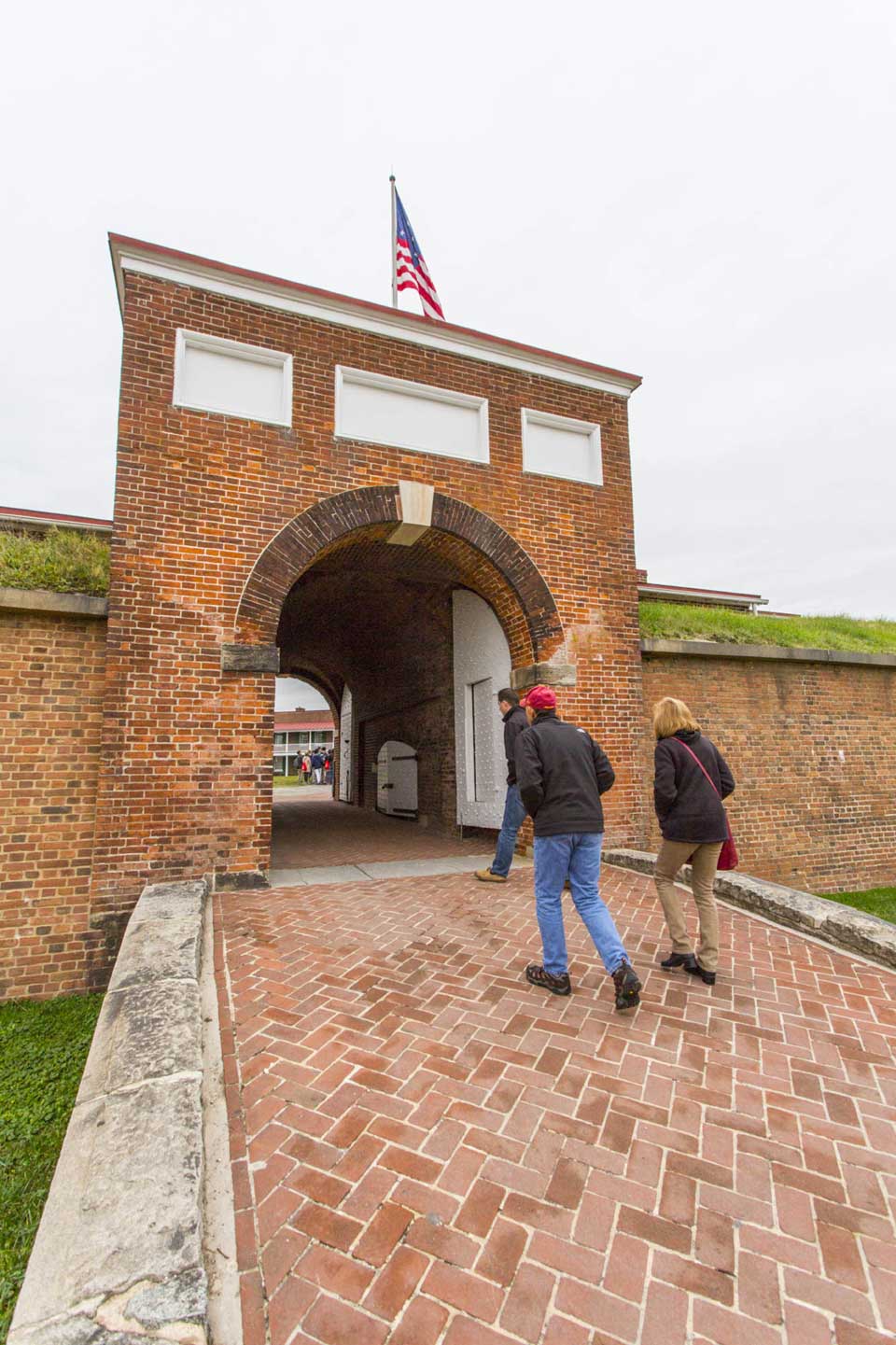 People walking in to Ft McHenry in Locust Point, Baltimore, MD