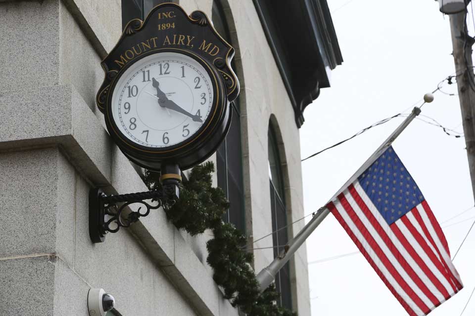 Clock and american flag in Mount Airy, MD