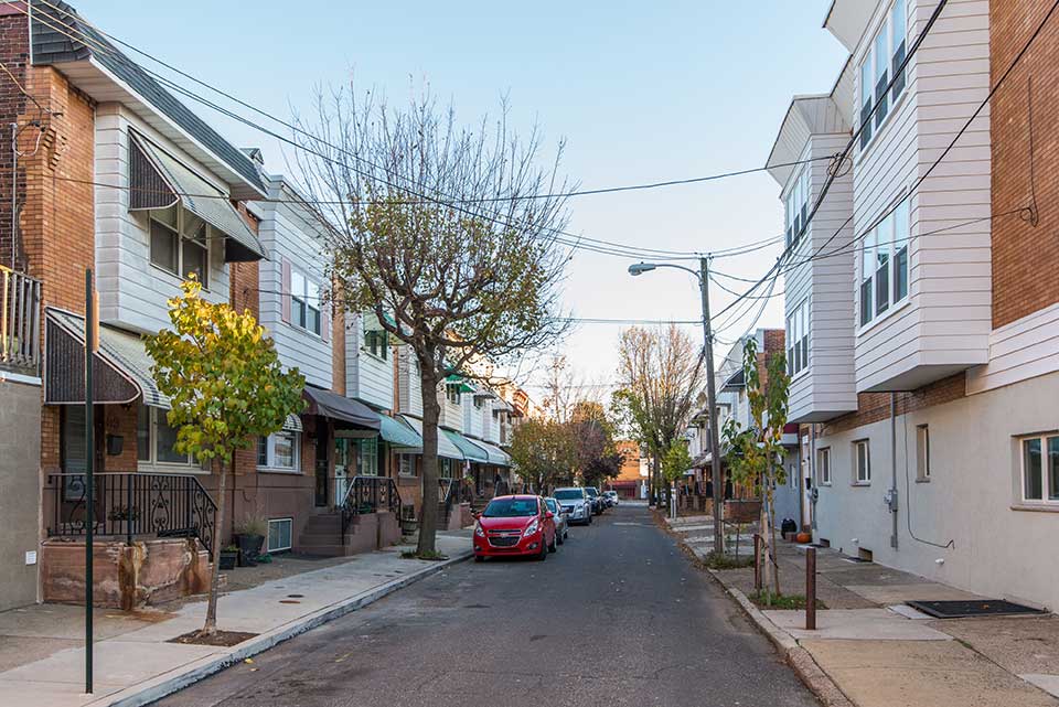 Residenntial street with row houses in East Passyunk, Philadelphia, PA