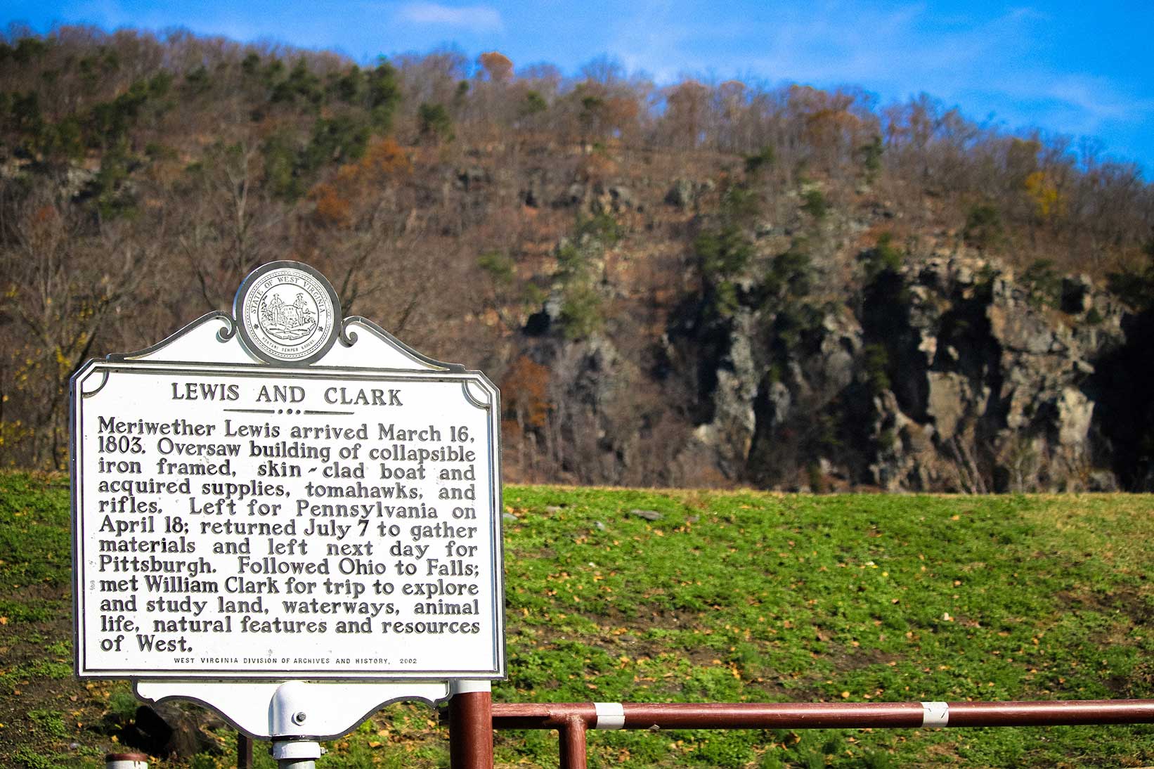 Lewis & Clark historical marker with mountains in background in Harper's Ferry, WV